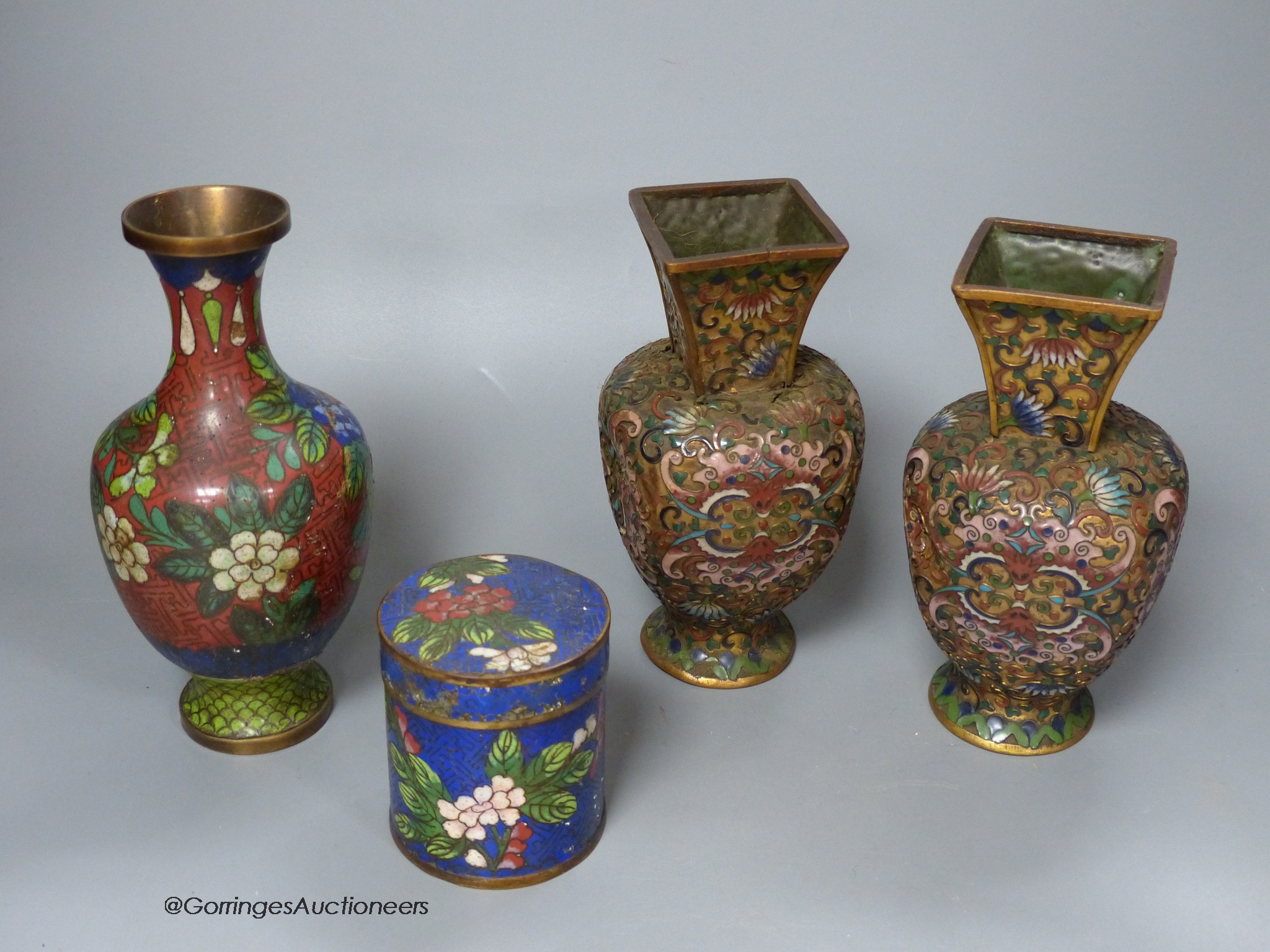 A pair of Chinese gilt ground cloisonné enamel vases, 16cm high a similar jar and cover